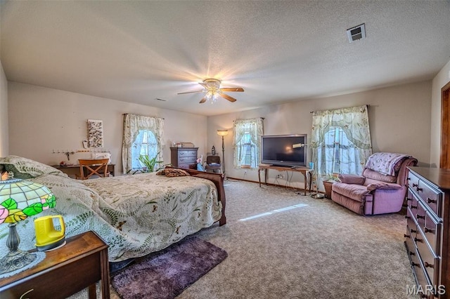 23598 Falcon Rd, Lebanon, MO 65536 - carpeted bedroom with a ceiling fan and a textured ceiling