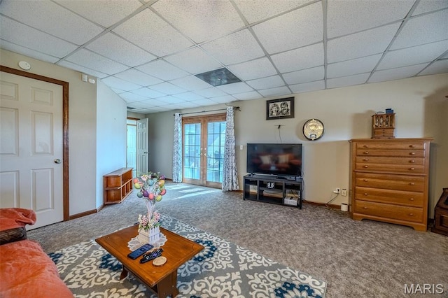 23598 Falcon Rd, Lebanon, MO 65536 - living room with carpet floors, a paneled ceiling, and baseboards