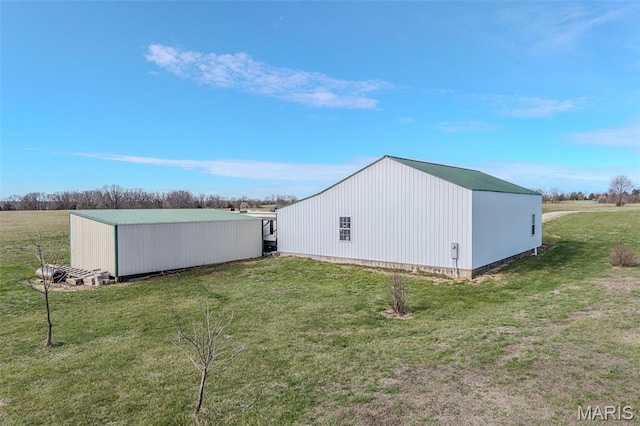 23598 Falcon Rd, Lebanon, MO 65536 - view of pole building with a yard