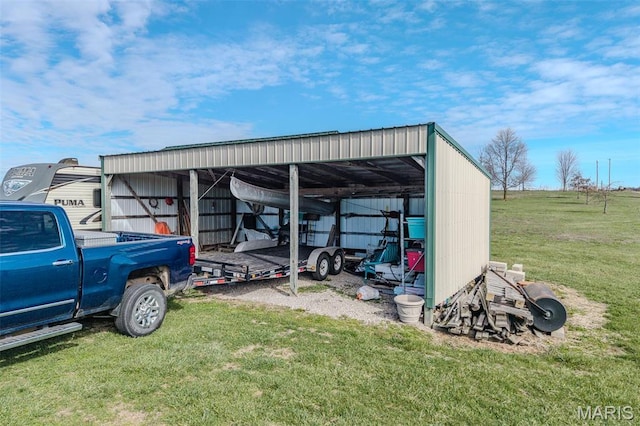 23598 Falcon Rd, Lebanon, MO 65536 - view of pole building with a detached carport and a lawn