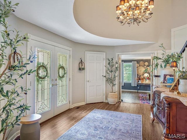 335 N Powder Mill Rd, Belleville, IL 62223 - foyer featuring a chandelier, french doors, and wood finished floors