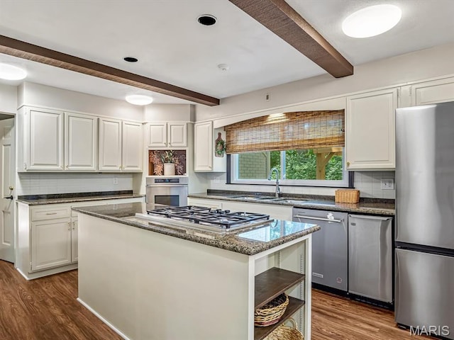 335 N Powder Mill Rd, Belleville, IL 62223 - kitchen featuring appliances with stainless steel finishes, open shelves, beam ceiling, dark wood-type flooring, and white cabinets