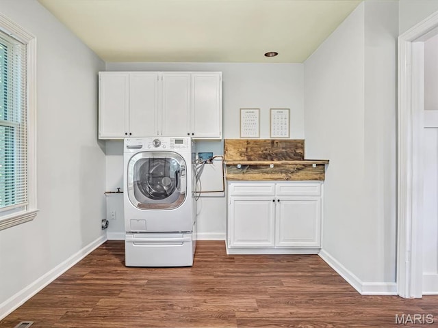 335 N Powder Mill Rd, Belleville, IL 62223 - laundry room featuring cabinet space, washer / dryer, and dark wood-type flooring