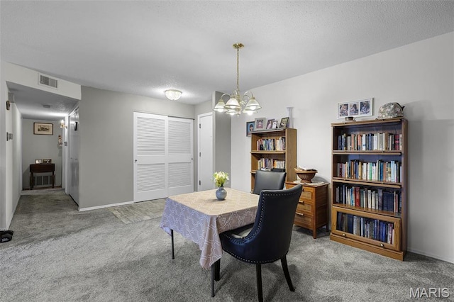 1511 Hampton Hall Dr Unit 22, Chesterfield, MO 63017 - dining room featuring carpet flooring, a chandelier, an office area, baseboards, and a textured ceiling