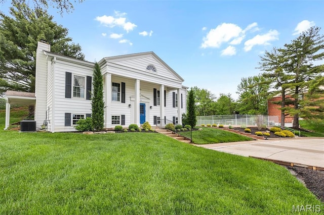 1511 Hampton Hall Dr Unit 22, Chesterfield, MO 63017 - greek revival house with a chimney and cooling unit