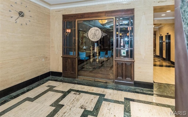 view of exterior entry with elevator