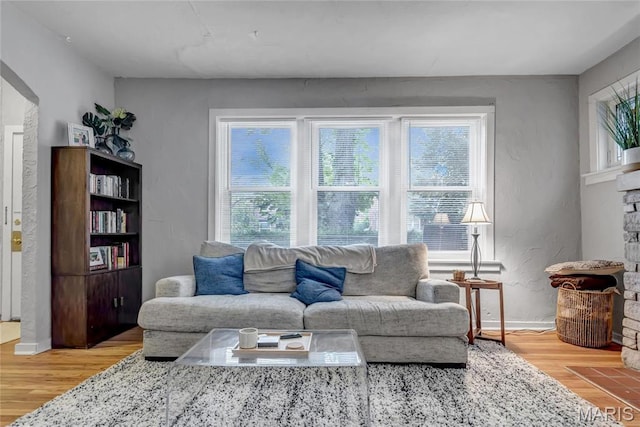 living area with light wood-style floors