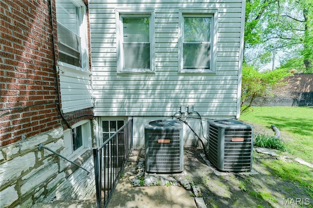 view of property exterior with cooling unit