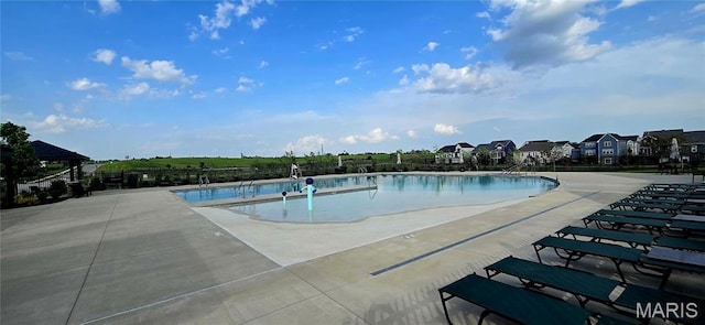 327 Dalriada Blvd, Ofallon, MO 63368 - community pool featuring fence, a patio area, and a residential view