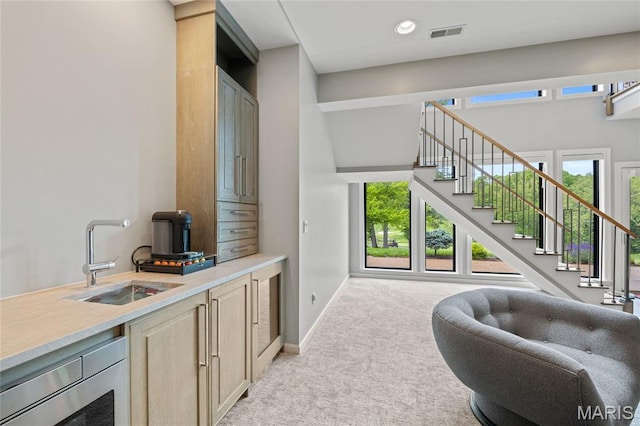 stairs with carpet flooring, baseboards, and recessed lighting