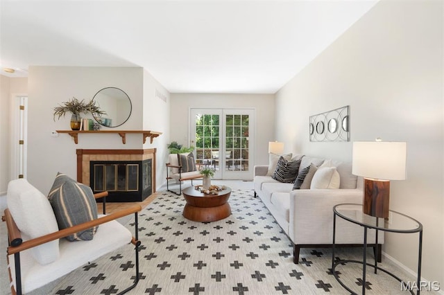 8704 Garden Ct, Brentwood, MO 63144 - living room with a fireplace and baseboards
