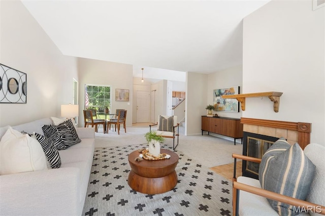 8704 Garden Ct, Brentwood, MO 63144 - carpeted living room featuring stairs