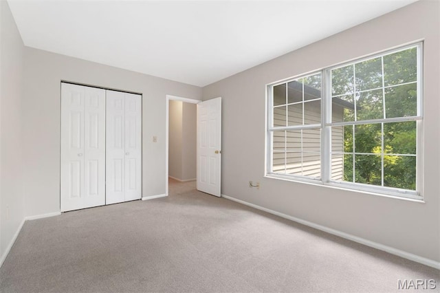 8704 Garden Ct, Brentwood, MO 63144 - unfurnished bedroom featuring carpet flooring and a closet