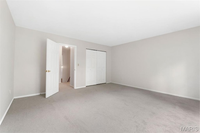 8704 Garden Ct, Brentwood, MO 63144 - unfurnished bedroom featuring carpet and a closet