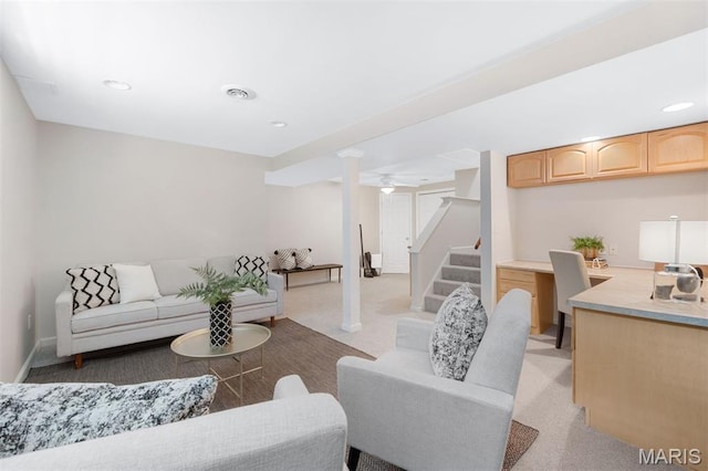 8704 Garden Ct, Brentwood, MO 63144 - living room with light carpet, decorative columns, stairs, and recessed lighting