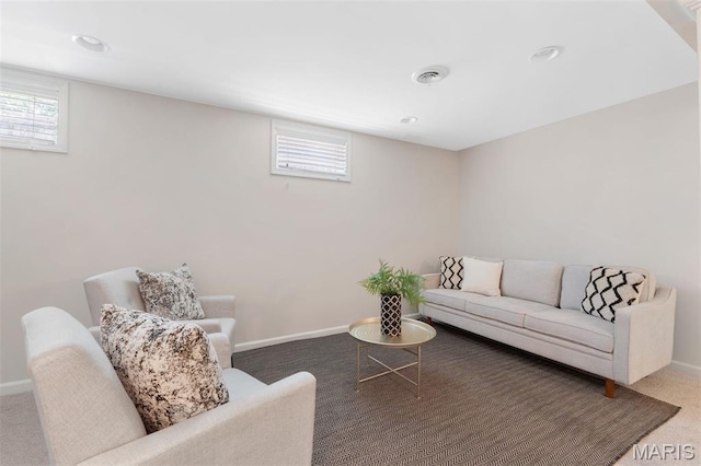 8704 Garden Ct, Brentwood, MO 63144 - carpeted living room featuring plenty of natural light