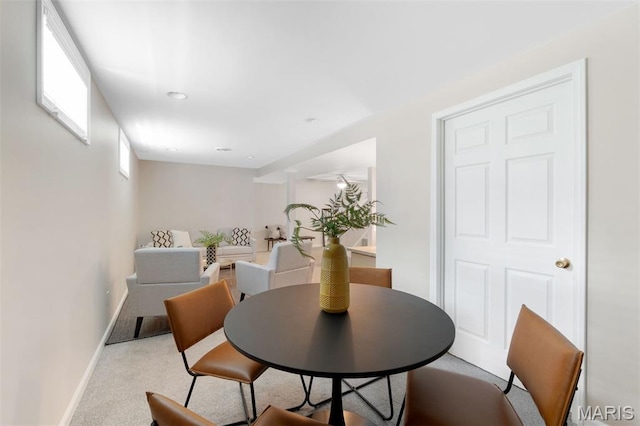 8704 Garden Ct, Brentwood, MO 63144 - dining room with carpet floors and baseboards