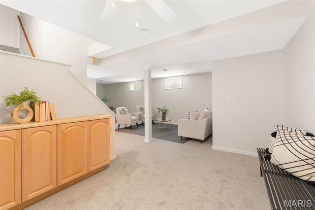 8704 Garden Ct, Brentwood, MO 63144 - sitting room featuring light carpet, a ceiling fan, and stairs
