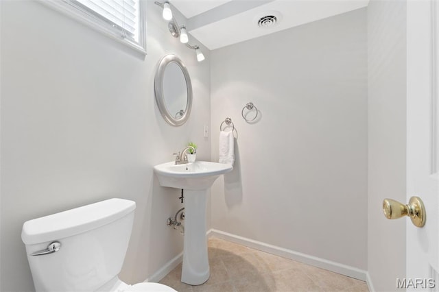8704 Garden Ct, Brentwood, MO 63144 - bathroom with toilet and tile patterned flooring
