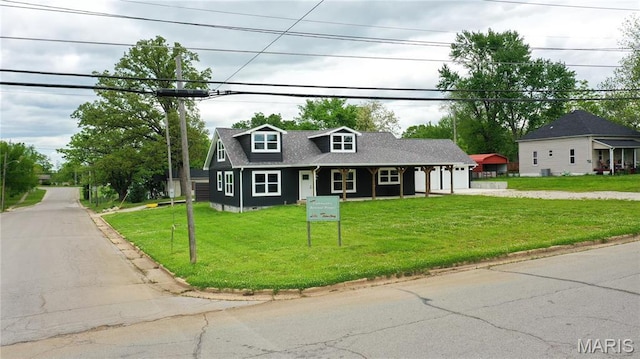 800 E Center St, Salem, MO 65560 - cape cod home with a front lawn, driveway, a porch, and roof with shingles