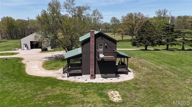 12503 County Road 292, Bloomfield, MO 63825 - view of playground with a lawn, an outdoor structure, and view of scattered trees