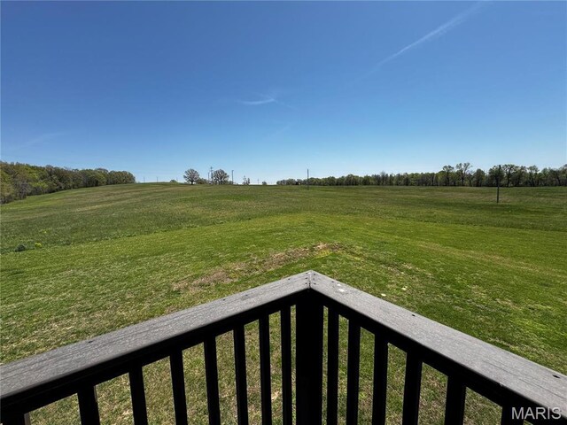 12503 County Road 292, Bloomfield, MO 63825 - view of grassy yard featuring a balcony and a rural view