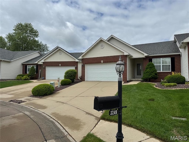 single story home featuring brick siding, an attached garage, driveway, a front yard, and roof with shingles
