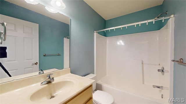 full bathroom with toilet, shower / washtub combination, and vanity