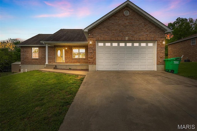 1824 Oak Knl, Farmington, MO 63640 - view of front facade featuring brick siding, concrete driveway, a yard, and a garage