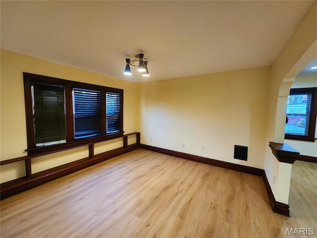 436 Hern Ave, Saint Louis, MO 63135 - spare room featuring light wood-style flooring and baseboards