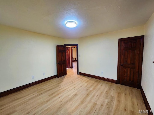 436 Hern Ave, Saint Louis, MO 63135 - empty room with light wood-type flooring and baseboards