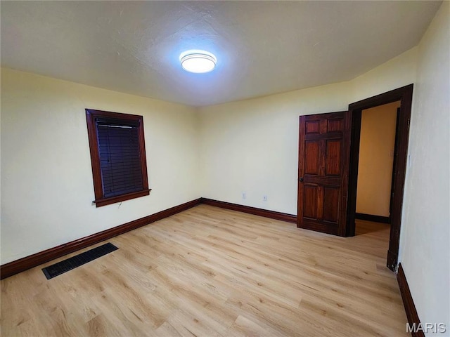 436 Hern Ave, Saint Louis, MO 63135 - spare room featuring light wood-type flooring and baseboards
