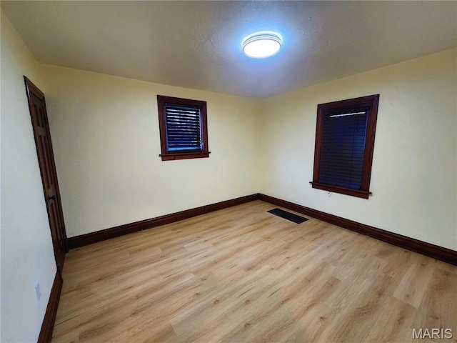 436 Hern Ave, Saint Louis, MO 63135 - empty room featuring light wood-style flooring and baseboards