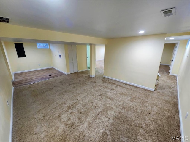 436 Hern Ave, Saint Louis, MO 63135 - finished below grade area with carpet, baseboards, and recessed lighting