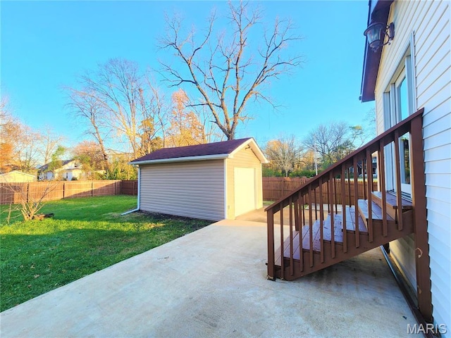 436 Hern Ave, Saint Louis, MO 63135 - view of patio / terrace with an outdoor structure, a storage shed, and stairway