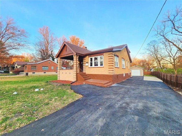 436 Hern Ave, Saint Louis, MO 63135 - view of property exterior with an outdoor structure and a garage
