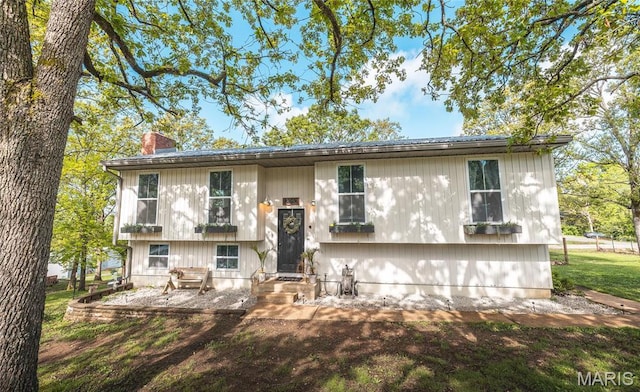 12052 Cedar Grove Rd, Rolla, MO 65401 - view of front of property with a chimney and entry steps