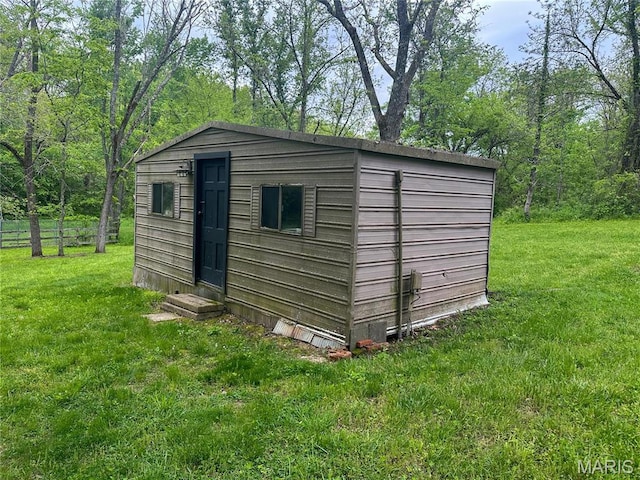 view of outbuilding with entry steps and an outbuilding