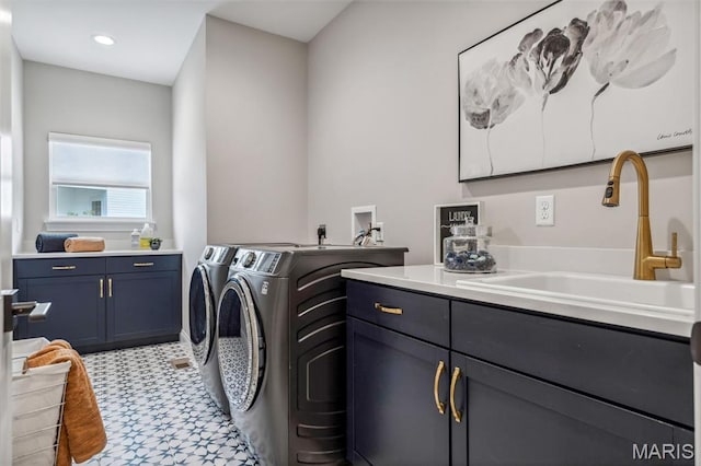 973 Tara Ct, Chesterfield, MO 63005 - washroom with cabinet space, washing machine and dryer, and light floors