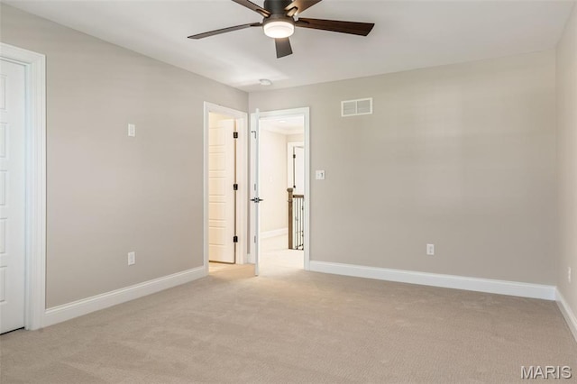973 Tara Ct, Chesterfield, MO 63005 - empty room featuring a ceiling fan and light carpet