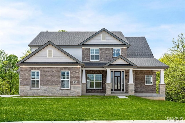 973 Tara Ct, Chesterfield, MO 63005 - craftsman-style home with roof with shingles, a front yard, and brick siding