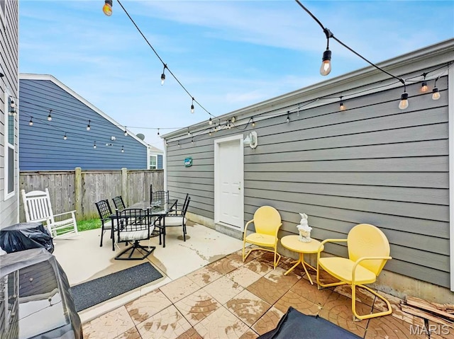 3242 Camp St, Saint Charles, MO 63301 - view of patio / terrace with fence and outdoor dining space