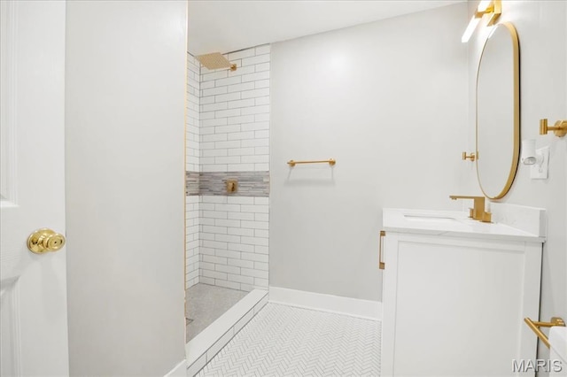 3431 California Ave, Saint Louis, MO 63118 - bathroom with a tile shower, vanity, and tile patterned flooring