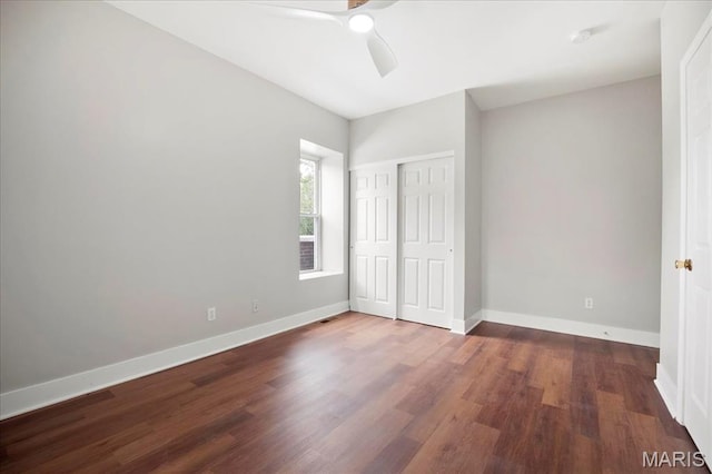 3431 California Ave, Saint Louis, MO 63118 - unfurnished bedroom featuring wood finished floors, baseboards, a closet, and ceiling fan