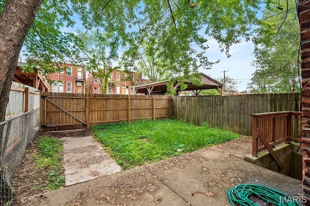 3431 California Ave, Saint Louis, MO 63118 - fenced backyard with a gate and a gazebo