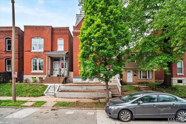 3431 California Ave, Saint Louis, MO 63118 - multi unit property featuring stairway and brick siding