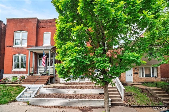 3431 California Ave, Saint Louis, MO 63118 - view of property featuring brick siding