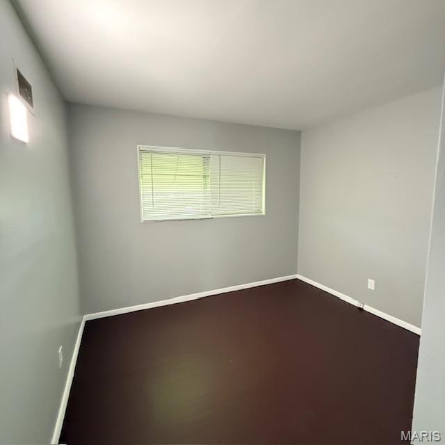 9732 Glen Owen Dr, Saint Louis, MO 63136 - empty room with baseboards