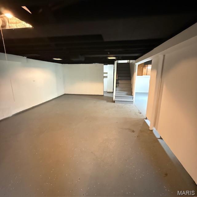 9732 Glen Owen Dr, Saint Louis, MO 63136 - below grade area featuring stairway