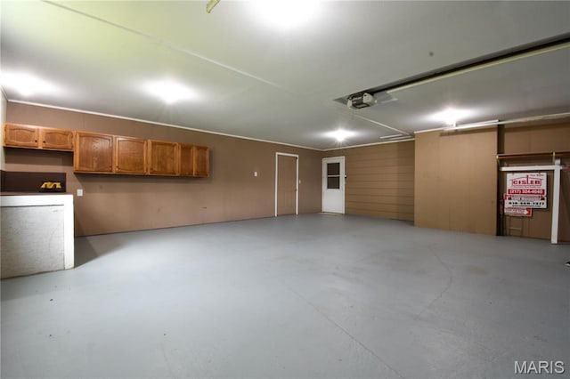 garage featuring a garage door opener